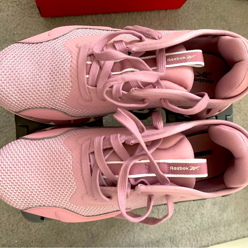 Adidas sneakers.  Worn twice.  Excellent condition